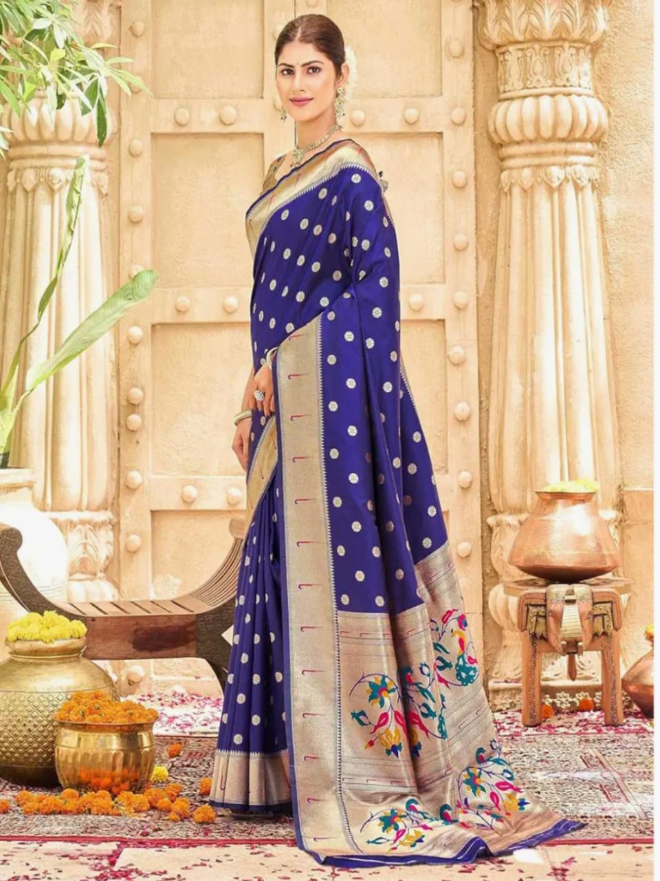 Stylish Saree with Small Dots and Detailed Border.