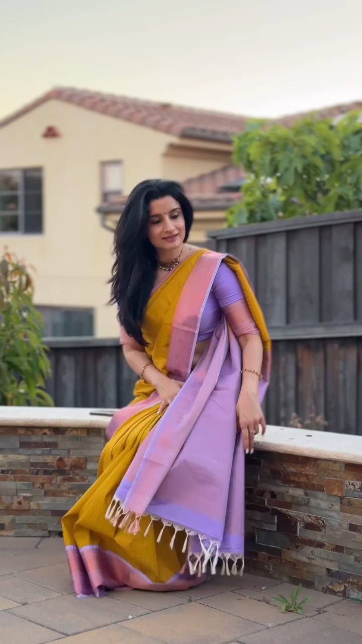 Golden Yellow Saree Elegance Paired With Soft Lavender Pallu Beauty.