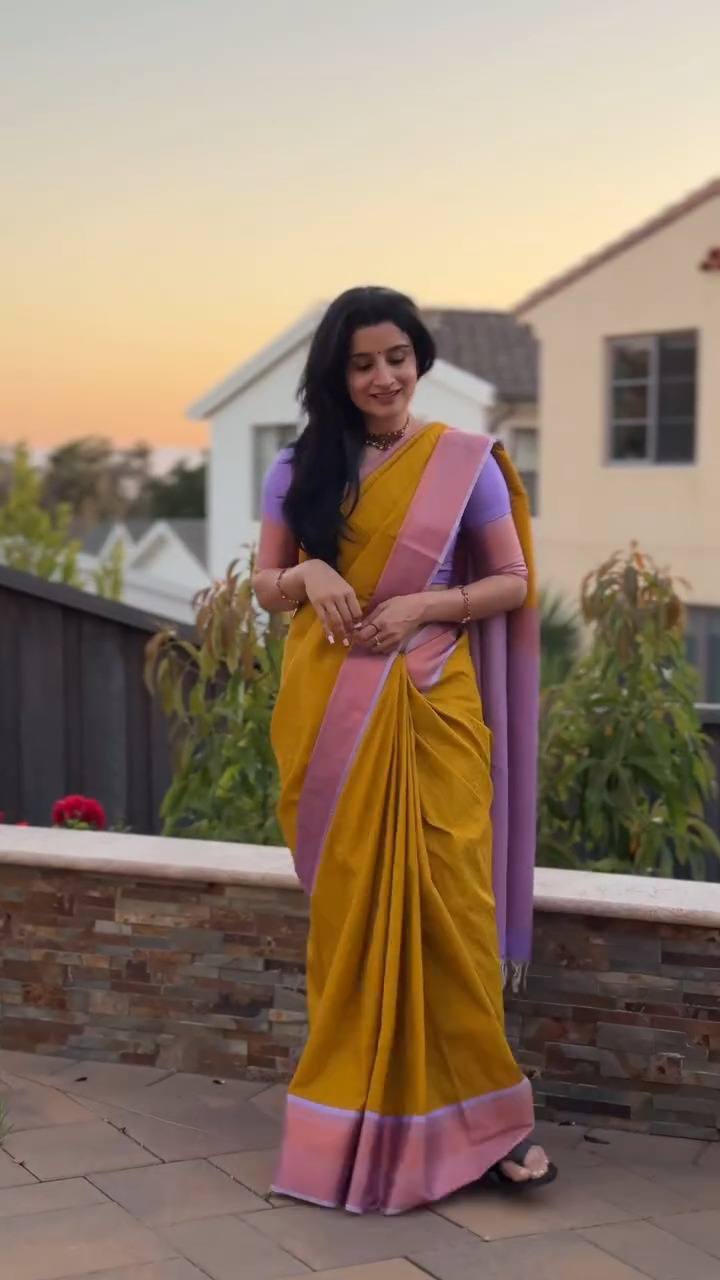 Golden Yellow Saree Elegance Paired With Soft Lavender Pallu Beauty.