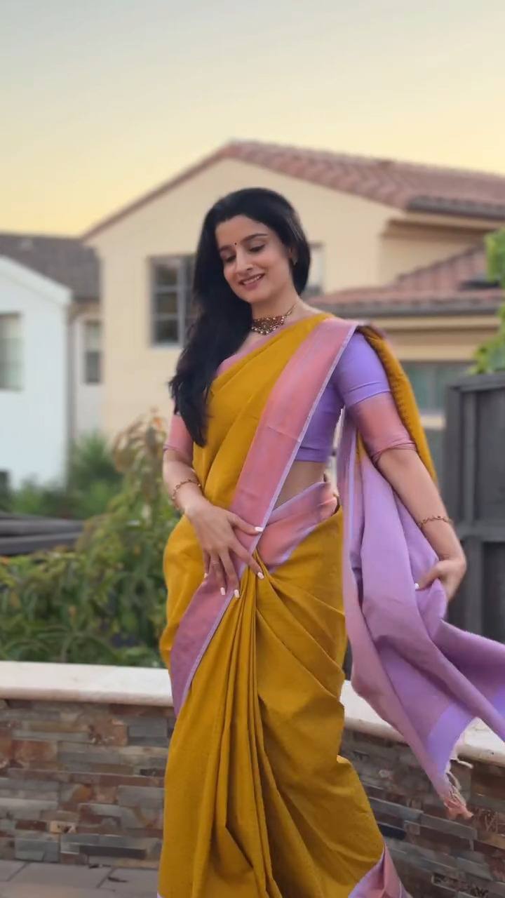 Golden Yellow Saree Elegance Paired With Soft Lavender Pallu Beauty.