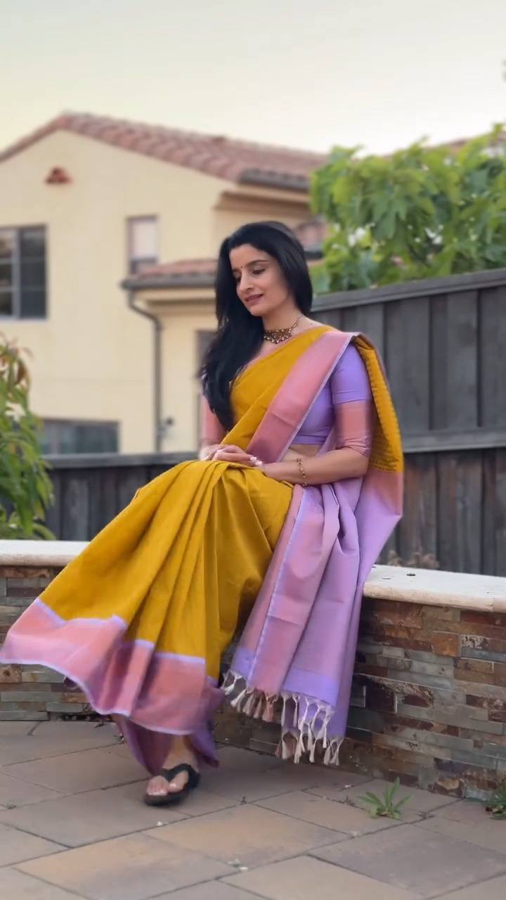Golden Yellow Saree Elegance Paired With Soft Lavender Pallu Beauty.