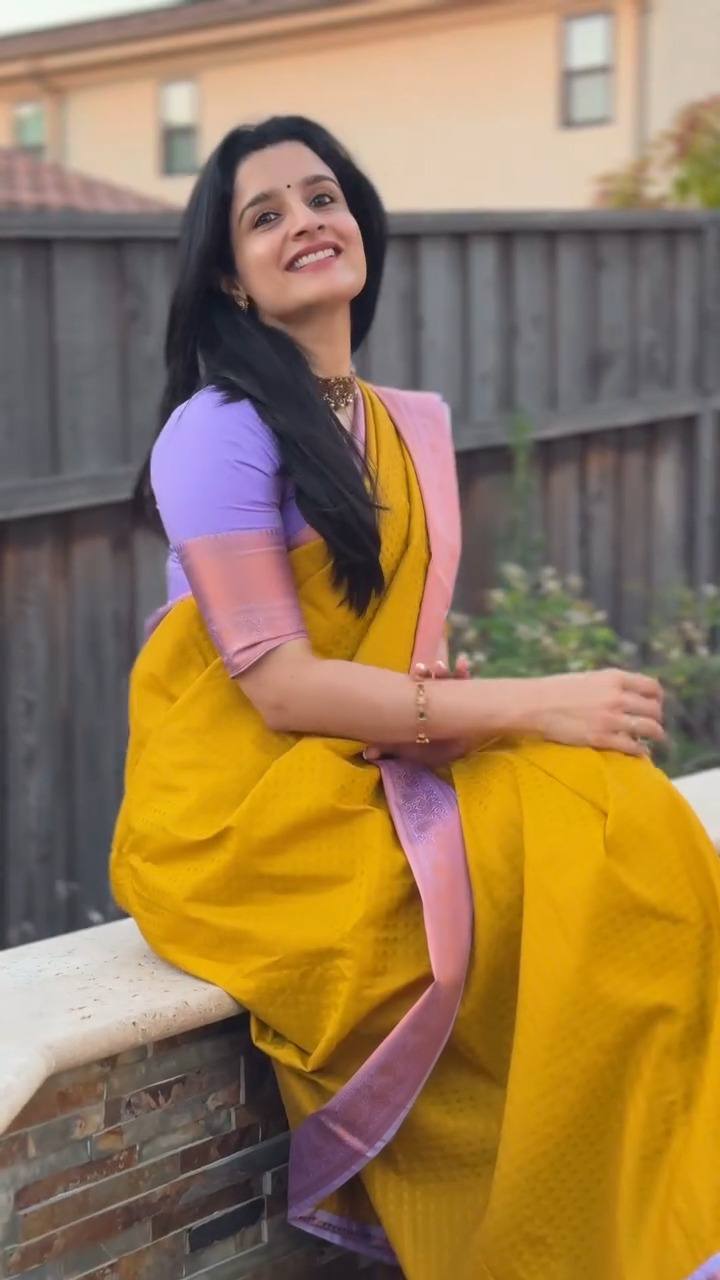 Golden Yellow Saree Elegance Paired With Soft Lavender Pallu Beauty.
